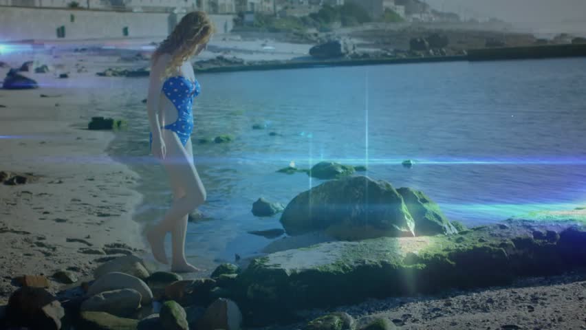 Woman stepping onto mossy rock on sandy beach initiating glowing network overlay for tech demo. Digital, connectivity, innovation, futuristic, nature-inspired, technology, environmental - Powered by Shutterstock - Get 15% off with code: PIKWIZARD15