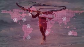 Man carrying windsurfing rig wading into sea lighting global map nodes connecting tech network. Technology, connectivity, communication, innovation, digital, global, network - Powered by Shutterstock - Get 15% off with code: PIKWIZARD15