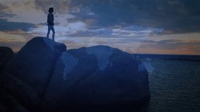 Woman retrieving smartphone on rock activating world map and swirling globe rings for tech briefing. Exploration, connectivity, innovation, adventure, technology, globalization, nature - Powered by Shutterstock - Get 15% off with code: PIKWIZARD15