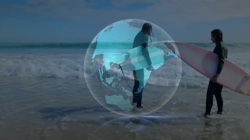 Surfers standing shoreline exchanging light orb and activating rotating digital globe for tech demo. Adventure, digital, innovation, teamwork, vibrant, outdoor, dynamic