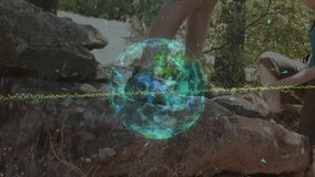 Senior hikers ascending boulder in forest after handing device and viewing holographic globe tech. Adventure, exploration, technology, nature, teamwork, outdoor, discovery - Powered by Shutterstock - Get 15% off with code: PIKWIZARD15