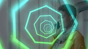 Neon polygon spiral appearing on grey drapes and guiding woman gaze as tech animation pulses. Futuristic, abstract, digital, vibrant, responsive, innovative, sleek - Powered by Shutterstock - Get 15% off with code: PIKWIZARD15