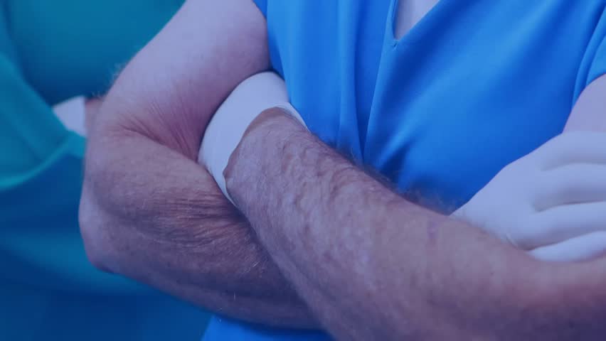 Surgeon and nurse crossing arms in operating room, spawning user icons appearing linking network. Medical, collaboration, connectivity, teamwork, healthcare, technology, hospital - Powered by Shutterstock - Get 15% off with code: PIKWIZARD15