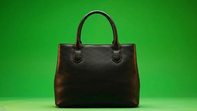 Stylish black leather tote bag on vibrant green, blending modern elegance. Perfect for fashion, retail, or advertisement highlighting everyday style and sophistication. - Powered by Shutterstock - Get 15% off with code: PIKWIZARD15