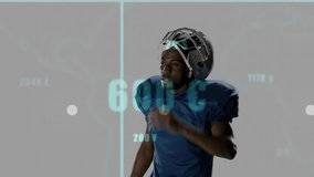 Football player removing helmet and initiating sports analytics pointing across charts on cyan grid. Athlete, analytics, futuristic, technology, performance, digital, innovation - Powered by Shutterstock - Get 15% off with code: PIKWIZARD15