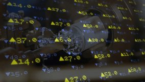 On signal robotic arm extending gripping rotating component as data scrolling ensuring alignment. Automation, manufacturing, precision, industry, robotics, engineering, technology - Powered by Shutterstock - Get 15% off with code: PIKWIZARD15