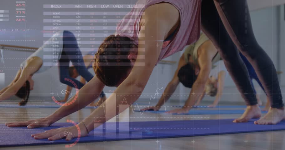 Instructor cuing yoga class into three-legged dog while fitness metrics updating for tracking. Wellness, fitness, mindfulness, collaboration, digital, health, active
