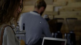 Barista finishing brewing coffee and woman lifting mug transparent overlay expanding across counter. Cafe, hospitality, digital, innovation, networking, aromatic, connection - Powered by Shutterstock - Get 15% off with code: PIKWIZARD15
