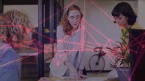 Design team collaborating at table, designer pointing at printed layout overlay linking smartphone. Collaboration, teamwork, digital integration, modern workspace, data visualization, creative - Powered by Shutterstock - Get 15% off with code: PIKWIZARD15