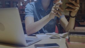 Male student grabbing stylus and tapping tablet, visualizing data for education with swirling icons. Technology, innovation, education, digital, holographic, learning, workspace - Powered by Shutterstock - Get 15% off with code: PIKWIZARD15