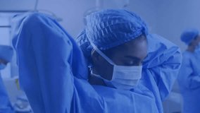 Surgeon raising cap straps and adjusting mask with floating metrics overlay guiding surgery prep. Medical, teamwork, precision, healthcare, clinical, safety, contemporary - Powered by Shutterstock - Get 15% off with code: PIKWIZARD15