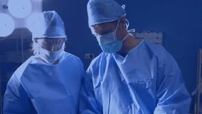 Two surgeons adjusting mask fit as social media icons swirling then fading in medical prep. Medical, collaboration, innovation, precision, technology, healthcare, teamwork - Powered by Shutterstock - Get 15% off with code: PIKWIZARD15