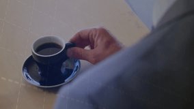 Right hand gripping coffee cup sparking data charts rising and smartphone rotating for insight. Business, professional, analytics, technology, modernization, workspace, productivity - Powered by Shutterstock - Get 15% off with code: PIKWIZARD15