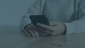 Woman tapping smartphone screen causing chart overlay climbing percentages for finance monitoring. Financial analysis, stock trading, digital analytics, technology, data visualization, businesswoman, - Powered by Shutterstock - Get 15% off with code: PIKWIZARD15