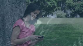 woman leaning on tree in park swiping smartphone, with tech charts shifting for data analysis. Urban, outdoor, wellness, innovation, connectivity, technology, casual - Powered by Shutterstock - Get 15% off with code: PIKWIZARD15