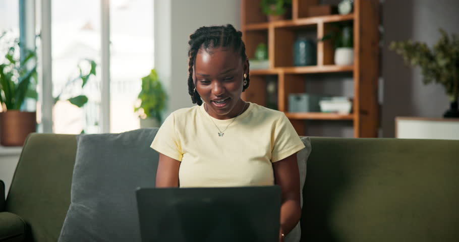 Explain, laptop and video call with black woman on sofa in living room of home for discussion. Computer, conversation and virtual meeting with happy African freelancer is apartment for communication