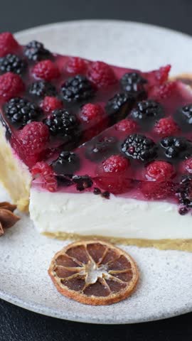 Pie, cheesecake with raspberries and blackberries, mascarpone cheese. Piece of cheesecake, sweet dessert with berries