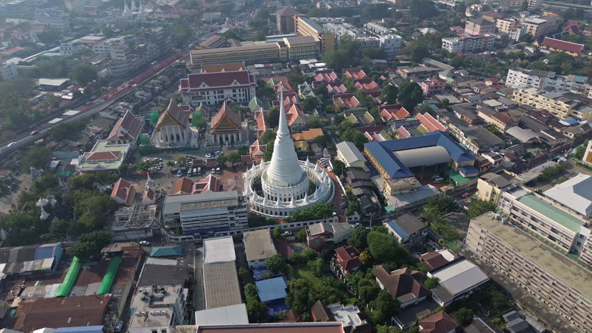 Aerial around view of Wat Prayurawongsawas Warawihan pagoda, Bangkok, Thailand, 4k