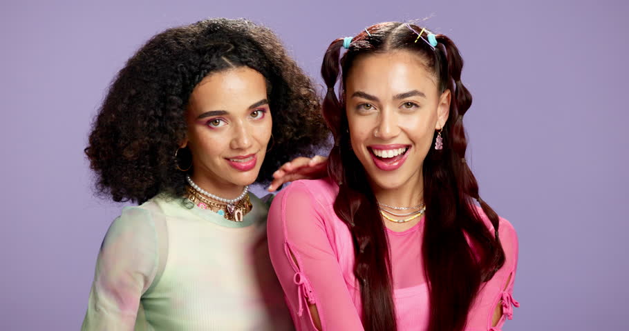 Fashion, face and friends with makeup in studio for eclectic aesthetic, trendy outfit and confidence. Gen z girls, bonding and happy on purple background with Y2K clothing, cosmetics and accessories