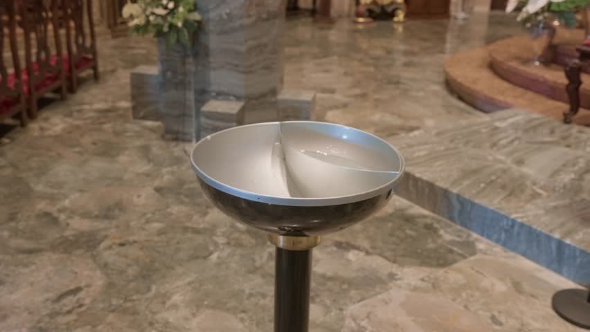 Closeup of baptismal font used for Christian baptism in church