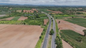 Vertical video aerial view of the countryside highway - Powered by Shutterstock - Get 15% off with code: PIKWIZARD15