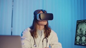 Medical Researcher in White Coat With Stethoscope Using VR Headset and Hand Gestures to Explore Virtual Brain Models. Concept of Immersive Technology in Neuroscience and Future Healthcare. - Powered by Shutterstock - Get 15% off with code: PIKWIZARD15