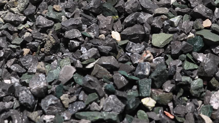 Construction stones used for cement mixing, Rock, Stone pile, Ideal for illustrating engineering or infrastructure projects