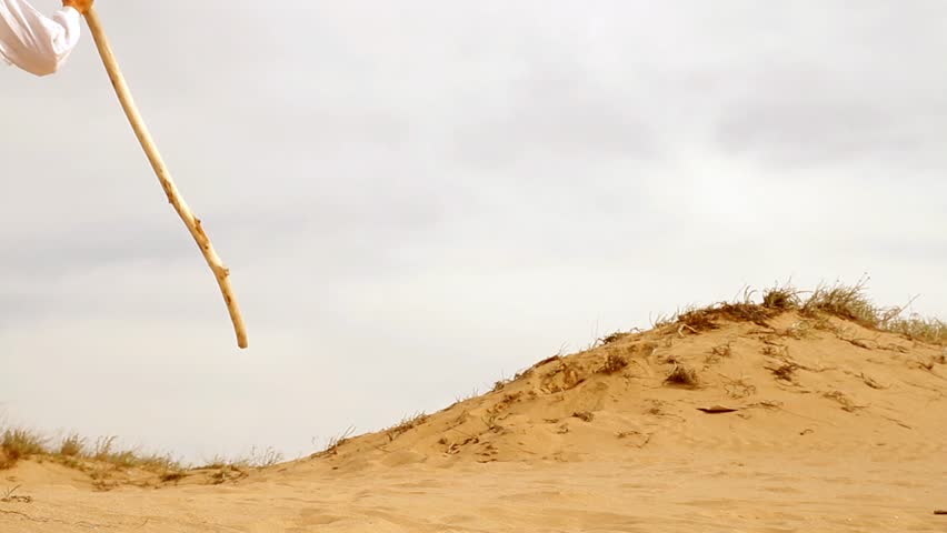 Old Man with Staff walking in Desert Concept HD