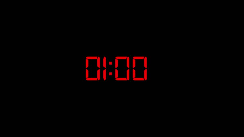 A digital clock displays 01:00 in bright red LED segments against a stark black background, signifying the final minute before midnight or a new hour.