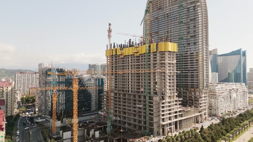 Batumi, Georgia - 19th august, 2025: Aerial view Alliance centropolis complex construction site. New real estate property buildings hotels. Batumi city Black sea coast luxury developments