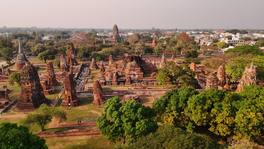 Ancient ruins of Ayutthaya historical park in Thailand, showcasing the majestic temples and rich history, Aerial view