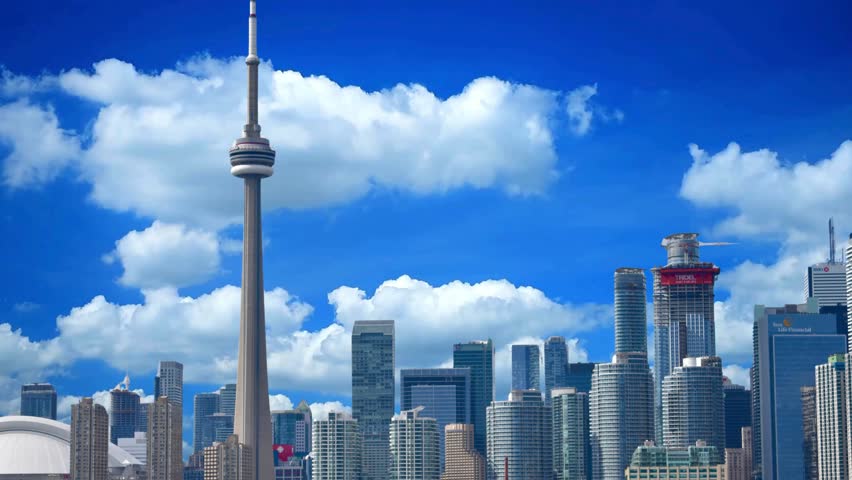 Toronto city skyline on clear sunny day, Ontario, Canada
View of the CN Tower and Rogers Center in Downtown Toronto from Toronto Center Island. Toronto, Canada 