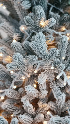 Christmas tree decorated by golden lights creating warm festive glow symbolizing joy winter celebration perfect holiday background, New Year mood, cozy interior atmosphere, Christmas marketing greetin