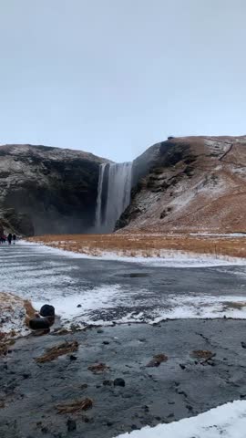 View of Skogafoss waterfall on the Skoga River - Iceland. Great autumn scene of Skoga river. Amazing landscape of Iceland, Europe. Beauty of nature concept background. Beautiful torrent of skogafoss.