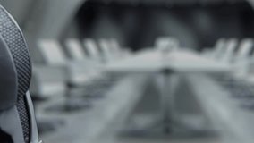 A robotic hand points at a digital shield, symbolizing the intersection of technology and cybersecurity in a cutting-edge digital environment full of protective measures. Auvana - Powered by Shutterstock - Get 15% off with code: PIKWIZARD15