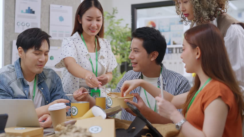 Creative business  product developers actively brainstorm ideas, sharing discussions ESG  green energy focusing on product repackaging and reuse strategies to reduce costs maximize profit business
