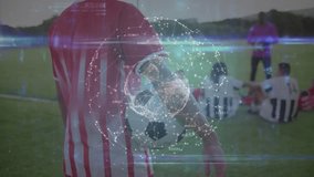 Soccer player holding ball, turning head toward camera, activating pulsing tech holographic globe. Athletic, teamwork, digital, innovation, sports, training, connectivity - Powered by Shutterstock - Get 15% off with code: PIKWIZARD15