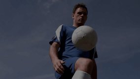 Male athlete lifting knee and juggling soccer ball while tech grid overlay animating analytics. Athlete, sports, visualization, analytics, performance, biomechanics, digital - Powered by Shutterstock - Get 15% off with code: PIKWIZARD15