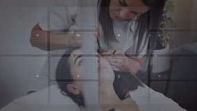 Spa aesthetician powering ultrasonic probe across face, tracking skin data via transparent overlays. Skincare, beauty, technology, wellness, relaxation, clinical, diagnostics - Powered by Shutterstock - Get 15% off with code: PIKWIZARD15