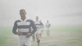 Lead runner jogging in rugby jersey camera panning fading in network icons showing sports analytics. Athleticism, teamwork, fitness, data visualization, sports technology, outdoor, competitive - Powered by Shutterstock - Get 15% off with code: PIKWIZARD15