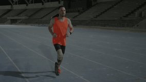 Male athlete running using prosthetic blade fading candlestick charts mapping performance in tech. Athlete, performance, analytics, biomechanics, innovation, fitness, endurance - Powered by Shutterstock - Get 15% off with code: PIKWIZARD15