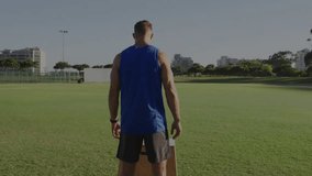 Man approaching box on sports field jumping onto box and generating holographic metrics. Fitness, training, agility, sport, digital, analytics, outdoor - Powered by Shutterstock - Get 15% off with code: PIKWIZARD15