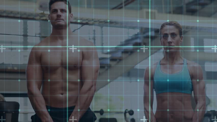 Partners standing with kettlebells performing upright rows with grid-tracking for fitness analysis. Strength training, functional fitness, motion analysis, workout partners, gym equipment, - Powered by Shutterstock - Get 15% off with code: PIKWIZARD15