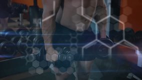 Muscular man performing lateral raises in gym, activating holographic DNA helix for muscle analysis. Fitness, strength, technology, innovation, gym, biomechanics, health - Powered by Shutterstock - Get 15% off with code: PIKWIZARD15