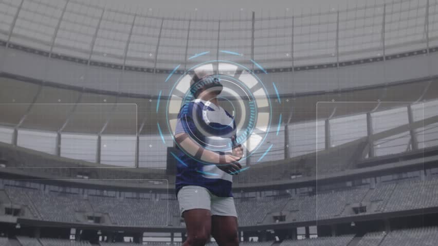 Male rugby player gripping ball and activating HUD in stadium while analyzing data via charts. Athlete, technology, innovation, sports, futurism, data, analysis - Powered by Shutterstock - Get 15% off with code: PIKWIZARD15
