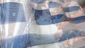 Inventory specialist entering warehouse aisle updating records using tablet amid flag overlay. Industrial, tech, modern, logistics, organization, professional, efficiency - Powered by Shutterstock - Get 15% off with code: PIKWIZARD15