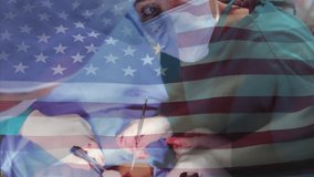 US flag overlay appearing, lead surgeon aligning forceps and using scissors during surgery. Medical, healthcare, operation, professionalism, precision, teamwork, sterile - Powered by Shutterstock - Get 15% off with code: PIKWIZARD15