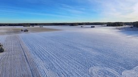 Aerial drone view of morning winter landscape. Snow trees and frosty fog on the field in Finland  - Powered by Shutterstock - Get 15% off with code: PIKWIZARD15