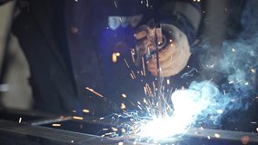 Welding process with bright sparks and smoke - Powered by Shutterstock - Get 15% off with code: PIKWIZARD15