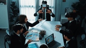 Top view of manager working on laptop and sending data analysis to business people by using VR glass headset while diverse team planning marketing strategy and looking at financial graph. Directorate. - Powered by Shutterstock - Get 15% off with code: PIKWIZARD15